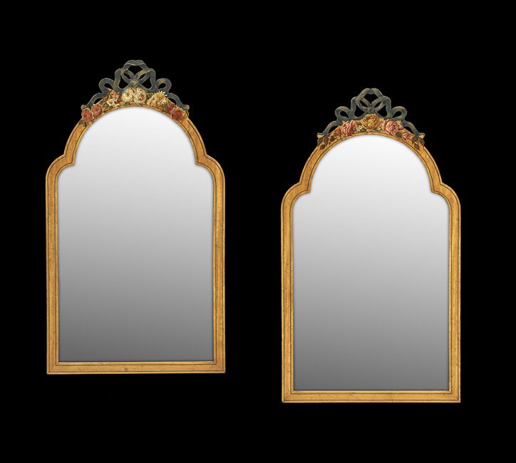 Pair of Edwardian Painted Fruitwood Mirrors: Pair of Edwardian Painted Fruitwood Mirrors in the Adam Taste, first quarter 20th century, the arched tops with crests painted with flowers and pierced ribbons, h. 35-1/4", w. 20".