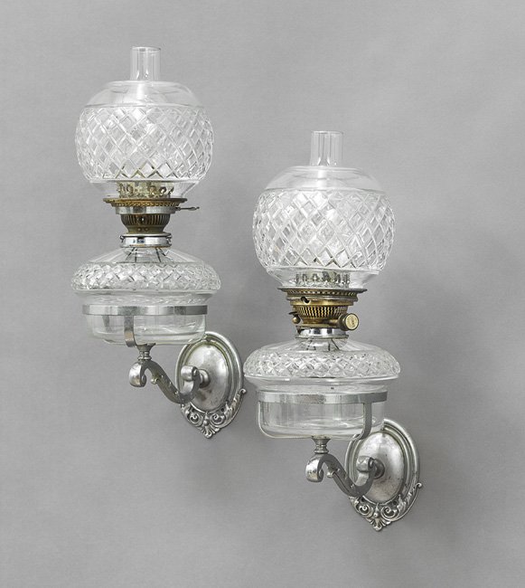 Pair of Thomas Messenger Nickel-Plated Sconces: Impressive Pair of Rare Thomas Messenger Cut Glass and Nickel-Plated Brass Oil Wall Sconces, fourth quarter 19th century, Birmingham, England, the scroll-molded backplates and arms supporting fonts cu