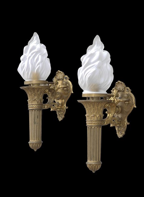 Pair of Beaux Arts Cast Gilt-Bronze Sconces: Pair of Beaux Arts Heavy, Cast Gilt-Bronze Sconces, ca. 1900, probably French, the cartouche-form backplates holding fluted, torch-form lights, molded with Egyptian capitals, and having an unusual, hi
