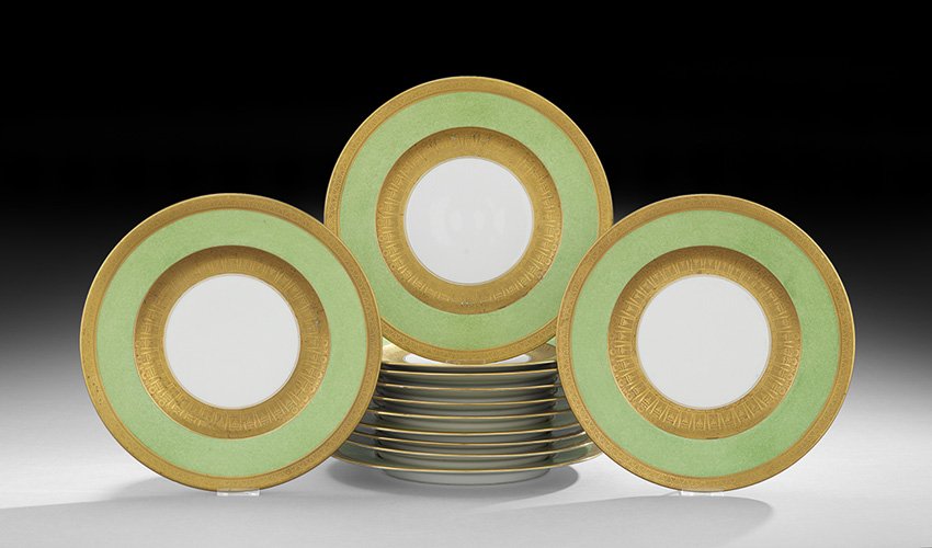 12 Bavarian Art Deco Raised Gilt Service Plates: Set of Twelve Bavarian Art Deco Raised Gilt Service Plates, second quarter 20th century, each with a raised gilt Art Deco inner and outer trim on a jade-colored ground, marked by Hutschenreuther, Selb