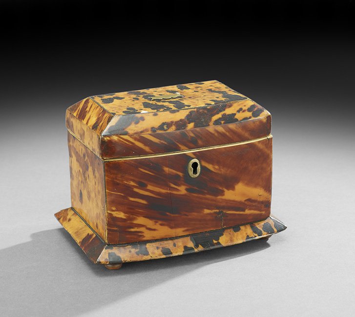 Late Victorian Tortoiseshell Bowfront Tea Caddy: Late Victorian Tortoiseshell Bowfront Tea Caddy, fourth quarter 19th century, fitted with a brass escutcheon and a two-compartment interior, raised on bun feet, h. 4-1/4", w. 5-3/4", d. 4-1/4".
