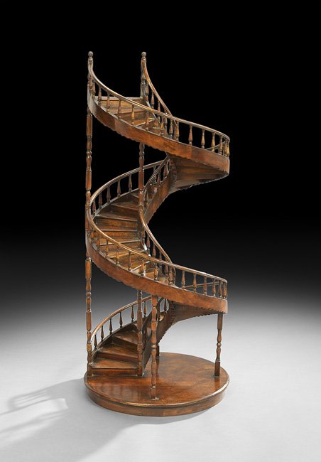 Mahogany Spiral Staircase Model: Mahogany Spiral Staircase Model, with turned balusters and shaped support rails, terminating in carved newel post finials, h. 41-3/4", dia. 18".