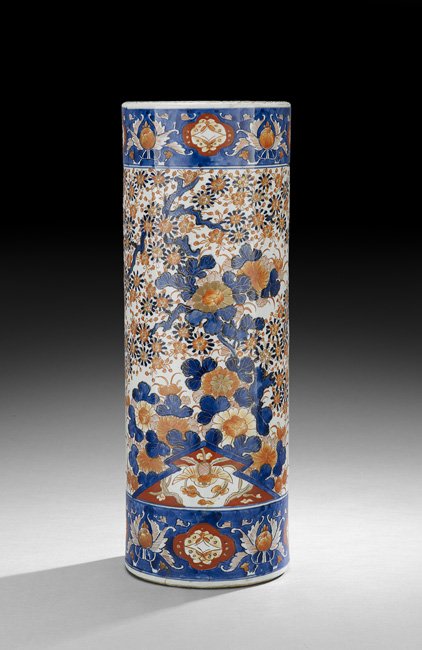 Imari Umbrella Stand: Imari Umbrella Stand, probably 19th century, the cylindrical vessel with an iron-red underglaze and blue foliate decoration, h. 24-1/4", dia. 8-3/4".