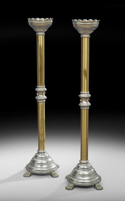 Pair of Unusual English Brass Altar Sticks: Pair of Unusual English Brass Altar Sticks, fourth quarter 19th century, decorated with contrasting nickel plating, the stepped bases resting on paw feet, the nickel-plated mid-rib set with gilt-bronz