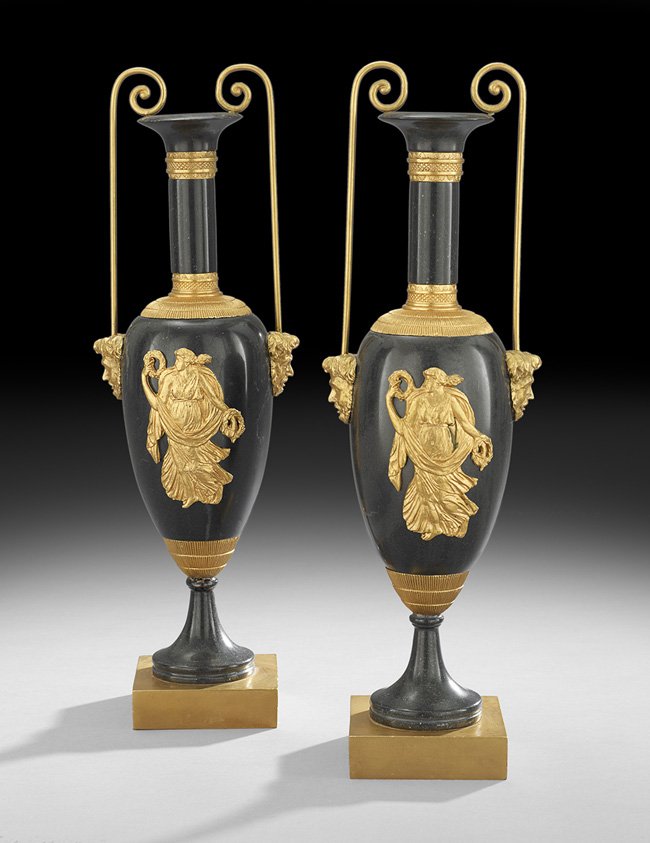 Pair of French Empire-Style Bronze Garniture Urns: Pair of French Empire-Style Bronze Garniture Urns, the patinated bronze urns decorated with contrasting gilt-bronze mounts, depicting classical figures of Victory, the handles terminating in masques, 