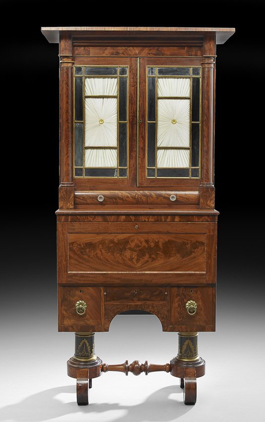 American Stenciled Mahogany Secretary Bookcase: American Late Classical Stenciled Mahogany Secretary Bookcase, second quarter 19th century, New York, in two parts, the upper section with a projecting cornice over a pair of glazed and mullioned door