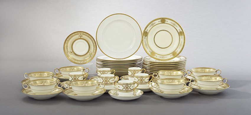 Collection of Tiffany-Retailed Gilt Porcelain: Extensive Collection of Tiffany-Retailed Raised Gilt Porcelain, early 20th century, including twelve Lenox luncheon plates, dia. 8-1/2", twelve Minton salad/dessert plates, dia. 7-1/2", eight Cauldon 