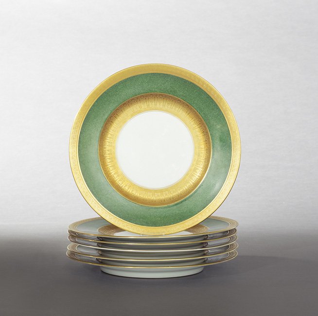 Six Hutschenreuther Art Deco Service Plates: Set of Six Hutschenreuther Art Deco Porcelain Service Plates, ca. 1920-1967, German, the richly detailed plates with raised gilt borders framing the shagreen ground, marked, dia. 11".
