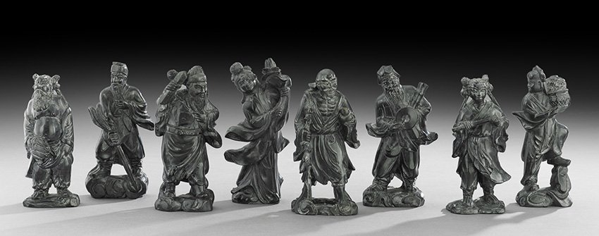 Eight Chinese Carved Soapstone Figures: Eight Chinese Carved Soapstone Figures, 20th century, the black-colored stone depicting the eight immortals, h. 5-1/2".