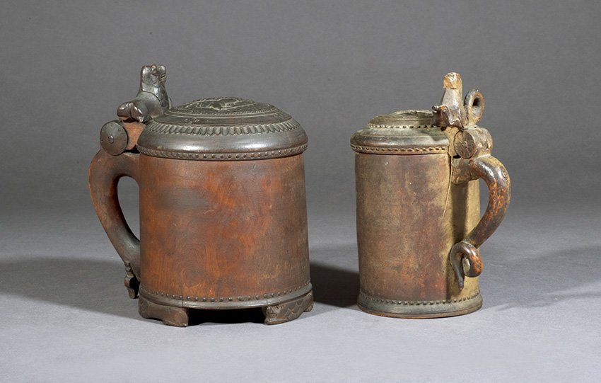 Two Scandinavian Carved Wooden Tankards: Two Scandinavian Carved Wooden Tankards, ca. 1900, in the medieval style, h. 9".