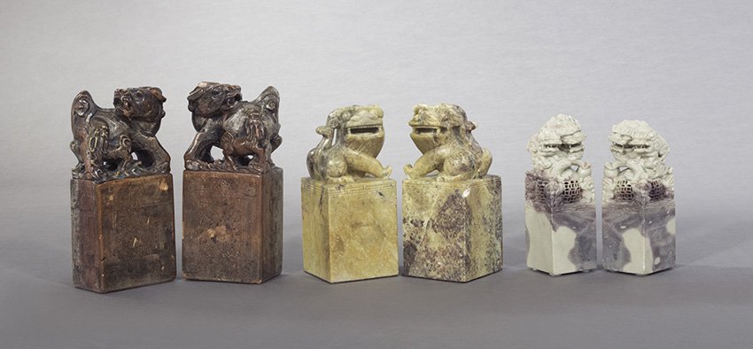 Six Chinese Seal-Type Soapstone Foo Dogs: Six Chinese Seal-Type Soapstone Foo Dogs on Pedestals, 20th century, the tallest, h. 7-1/2".