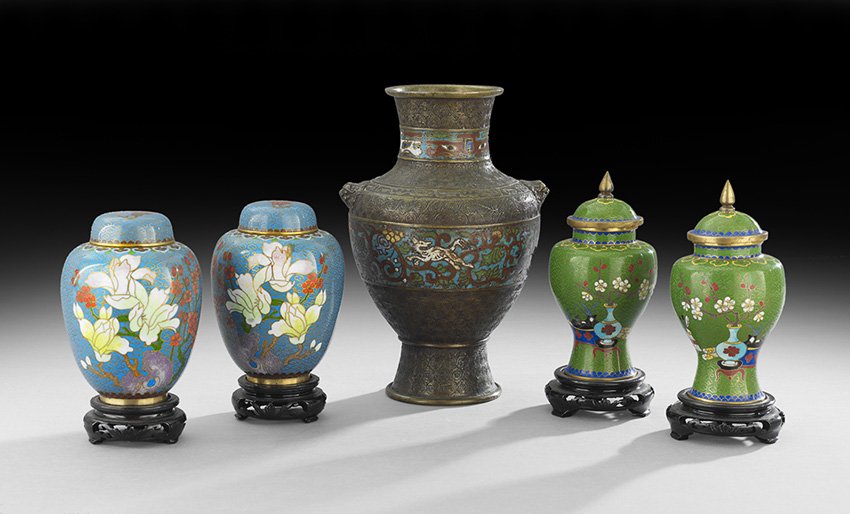 Five Pieces of Cloisonne: Five Pieces of Cloisonne, 19th/20th century, including a Japanese champleve vase and two pairs of Chinese lidded jars with wooden stands, the tallest, h. 9".