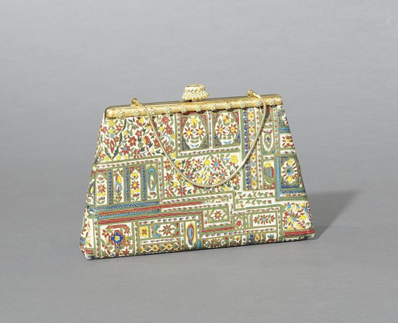 Vintage Frame Handbag: Vintage Frame Handbag, covered with Persian-patterned cotton, the front textured gold frame and flip clasp inset with turquoise beads, with a short drop-in snake link handle, the interior lined with c