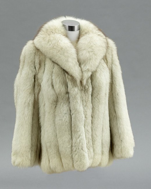 Luscious Silver Fox Jacket: Luscious Silver Fox Jacket, size 6, with a broad shawl collar, inset sleeves and two on-seam side pockets, two hook closure, silver satin-lined and labeled: "Godchaux's".