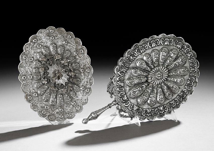Two Ottoman .900 Silver Cushion Mirrors: Two Ottoman .900 Silver Cushion Mirrors, reign of Mehmed V (1909-1918) or Mehmed VI (1918-1922), both with sah and tughra marks, each of scalloped oval form, decorated with lobed repousse flowers and