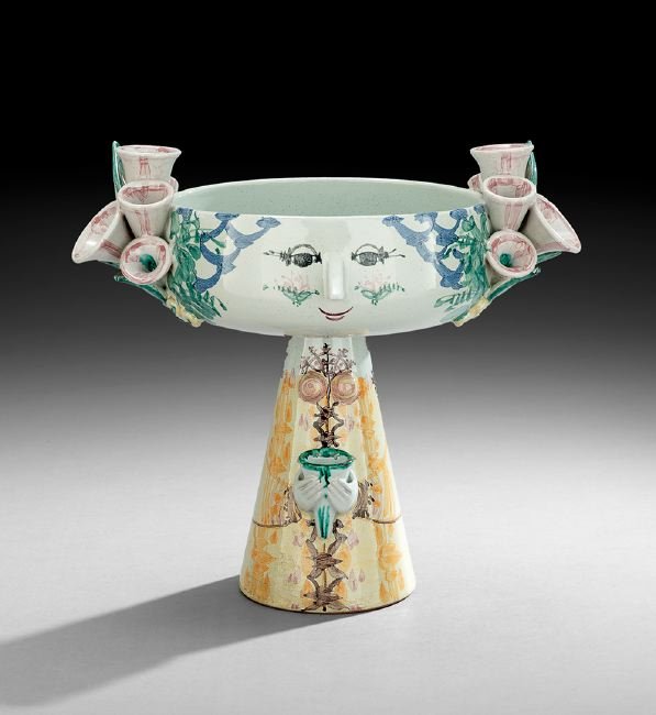 Vintage Pottery Compote by Bjorn Wiinblad: Vintage Figural Pottery Compote by Bjorn Wiinblad (Danish, 1918-2006), ca. 1979, in the form of a smiling figure holding a cone-shaped cup, marked, h. 11-1/4", dia. 12".