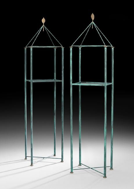 Pair of Mario Villa, New Orleans, Shelf Stands: Pair of Mario Villa, New Orleans, Verdigris-Patinated Iron and Brass Shelf Stands, 1985, of obelisk form, each fitted with a black plexiglass shelf, a leaf-form finial and X-stretchers at the base, h.
