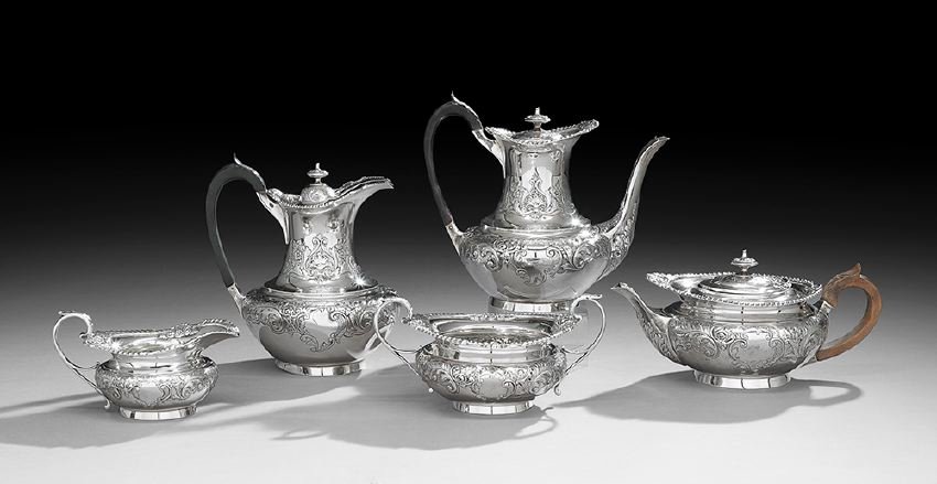 Five-Piece Edwardian Sterling Silver Tea Set: Assembled Five-Piece Edwardian and Later Sterling Silver Tea and Coffee Set, hallmarked London, 1902-1903, by Reid & Sons, including a teapot, h. 4-1/2", l. 10-3/4", an open sugar bowl, h. 4-1/8", w. 