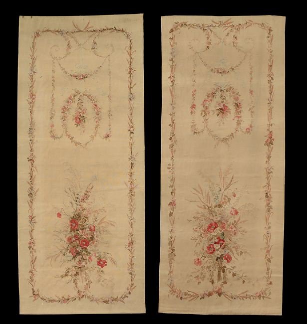 Pair of French Aubusson-Type Tapestries: Pair of French Aubusson-Type Tapestries, ca. 1900, of tall, rectangular form, with floral borders and swags of flowers supporting small bouquets on one end and larger bouquets on the other, h. 113-1/2
