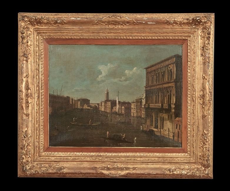 Circle of Bernardo Bellotto (Italian, 1721-1780): Circle of Bernardo Bellotto (Italian, 1721-1780), "Venetian Canal Scene", oil on canvas, verso with a later inscription "B. Bellotto", 21" x 27-1/2". Presented in a giltwood and gesso frame.