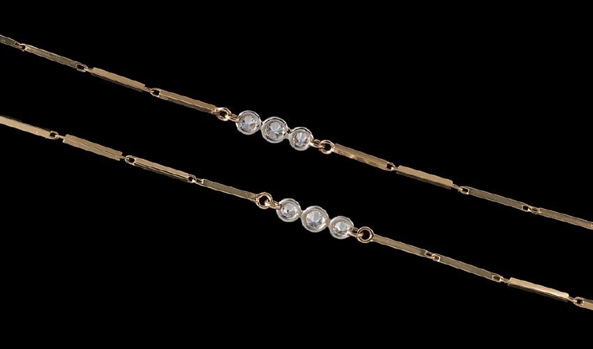 David Webb 18 Kt./Pt. and Diamond Choker: David Webb Eighteen-Karat Yellow Gold, Platinum and Diamond Choker, divided into four segments of seven yellow gold bars, separated by three platinum links set with three round brilliant-cut diamonds,