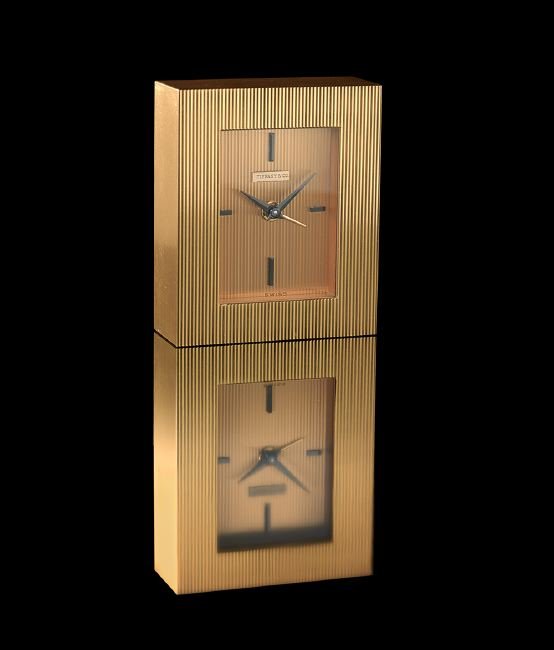 Vintage Tiffany & Co. Swiss Eight-Day Alarm Clock: Vintage Tiffany and Company Bronze Gold-Tone Swiss Eight-Day Alarm Clock, 1960s, the Art Deco-style rectangular case and dial with gadroon lines, the clock with a mechanical manual wind movement, the 