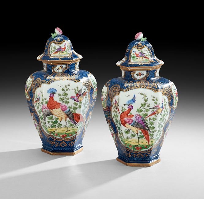 Pair of Worcester-Style Porcelain Garniture Vases: Pair of Worcester-Style Porcelain Covered Garniture Vases, fourth quarter 19th century, possibly Samson, Paris, of octagonal urn form, decorated with hand-painted birds in gilt-trimmed panels on a fie
