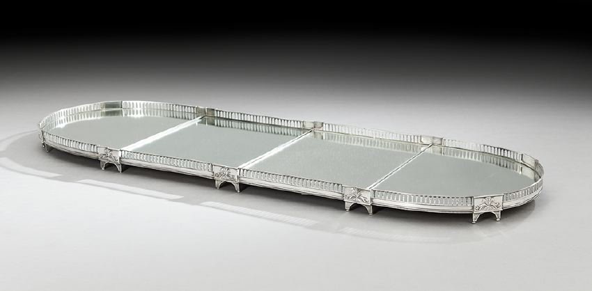 Louis XV-Style Mirrored Surtout de Table: Louis XV-Style Silvered Bronze and Mirrored Surtout de Table, second quarter 20th century, in four sections, with panels of molded leaves and berries, the sides decorated with a pierced arcade, the en