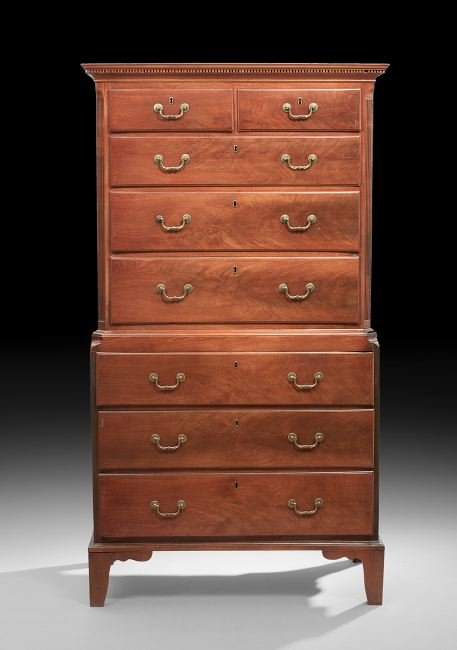 George III Mahogany Chest-on-Chest: George III Mahogany Chest-on-Chest, fourth quarter 18th century, the molded and dentillated cornice above a case fitted with two small drawers over three graduated long drawers, flanked by canted and 