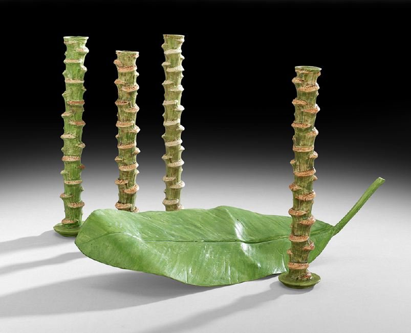 Mary Kirk Kelly (American/Alabama, 1918-2013): Mary Kirk Kelly (American/Alabama, 1918-2013), four banana stalk candlesticks, four of approximately fifteen created, h. 11-1/4" to 11-1/2", and a banana leaf tray, one of two created, l. 17", all sig