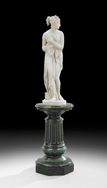 After Antonio Canova (Italian, 1757-1822): After Antonio Canova (Italian, 1757-1822), "Venus Italica" carved Carrara marble sculpture on pedestal, late 19th century, statue, h. 43", overall, h. 78", dia. 20". The sculpture "Venus Italica", oth