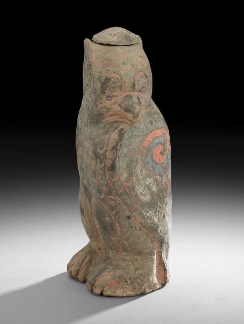 Chinese Pottery Owl-Form Wine Vessel: Chinese Pottery Owl-Form Wine Vessel, Han Dynasty (206 BC-220 AD), the painted figure with turned head and original lid, h. 14". A similar vessel is in the collection of the Musee Cernuschi, Paris, Fr