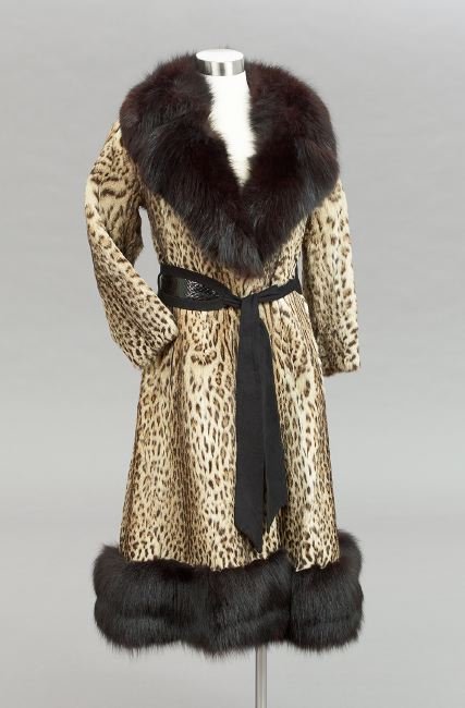 Vintage Ocelot and Black Fox Princess-Cut Coat: Chic Vintage Ocelot and Black Fox Princess-Cut Coat, 1970's, the broad notched collar and hem trimmed with black fox, with set-in three-quarter sleeves and two on-seam pockets, the black embroidered s