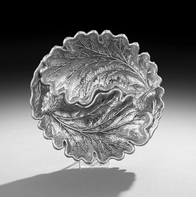 Buccellati Sterling Silver Dish: Buccellati Sterling Silver Dish, designed by Gianmaria Buccellati, Milan, executed by Clementi Fabbrica Argenteria, Bologna, realistically modeled in the form of a pair of oak leaves, dia. 7", 7.59 t.