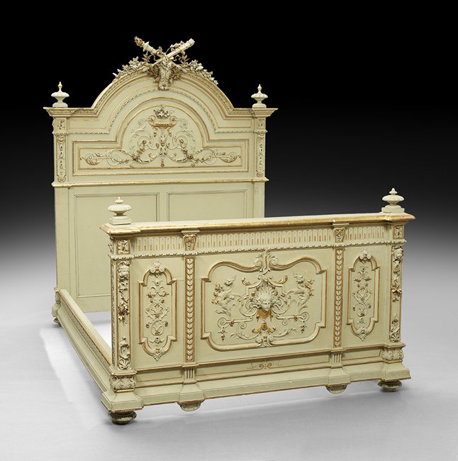 Three-Piece Italian Parcel-Gilt Bedroom Suite: Three-Piece Italian Painted and Parcel-Gilt Bedroom Suite, early 20th century, consisting of a bed and two wardrobe cabinets, the bed with a molded and domed cornice centered by an elaborate scrolling