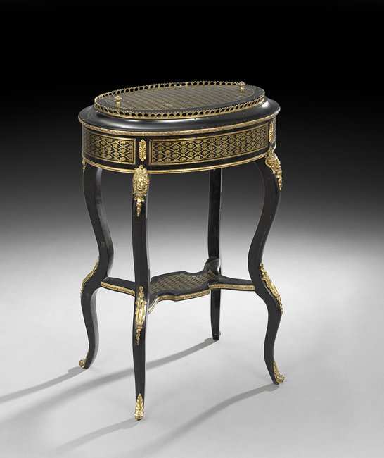 Napoleon III Ebonized Jardiniere Table: Napoleon III Ebonized Jardiniere Table, third quarter 19th century, the ovoid top with a removable lid revealing a removable metal liner, above a conforming frieze, raised on shaped legs joined by a s