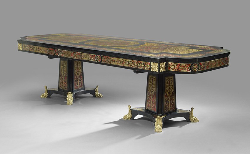 Brass and Shell-Inlaid Ebonized Banquet Table: Gilt Ormolu-Mounted Brass and Shell-Inlaid Ebonized Banquet Table in the Manner of Andre-Charles Boulle, of double pedestal form, the skirted apron with inlaid panels on tapering columns with like dec