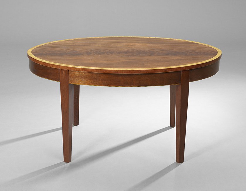Mahogany Coffee Table with Beveled Glass Top: Custom Hepplewhite-Style Mahogany Oval Coffee Table with a Beveled Glass Top, 20th century, English, the satinwood top with crossbanding, h. 20-1/2", w. 39-1/2", d. 26-1/2".