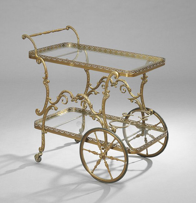 French Rococo-Style Bronze Tea/Cocktail Trolley: French Rococo-Style Cast Bronze Tea/Cocktail Trolley, first quarter 20th century, with cast bottle holders on the lower shelf, h. 30-1/2", w. 16-1/2", l. 29".