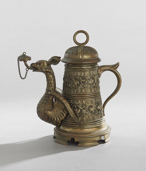 Unusual Brass Teapot: Unusual Brass Teapot, first quarter 20th century, with a griffin-form spout, molded scrollwork and Moorish arch feet, h. 10", dia. 5".