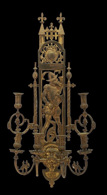 Monumental Baronial-Style Gilt-Bronze Sconce: Unusual, Monumental Gilt-Bronze Six-Light Sconce in the Baronial Style second quarter 20th century, with a Gothic backplate pierced with an image of a conquistador and the date "1572", possibly commem