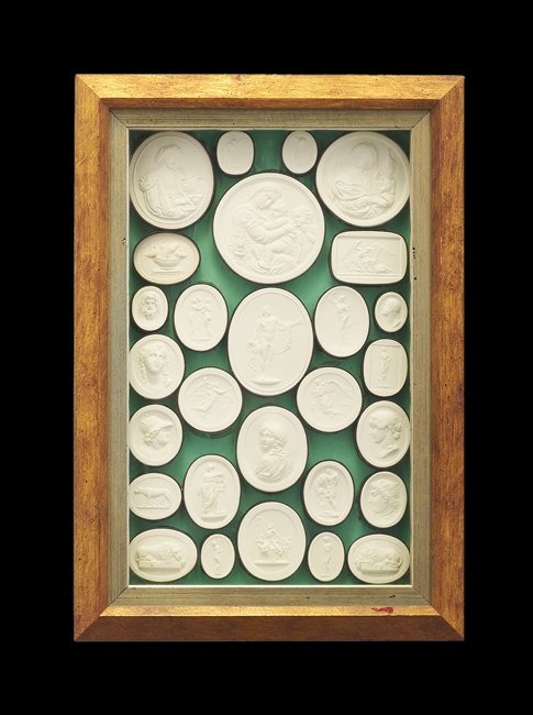 Two Collections of Grand Tour Plaster Roundelss: Pair of Framed Collections of Italian Grand Tour Plaster Roundels third quarter 19th century, the souvenir roundels decorated with familiar classical and Renaissance artworks after the Antiques, prese