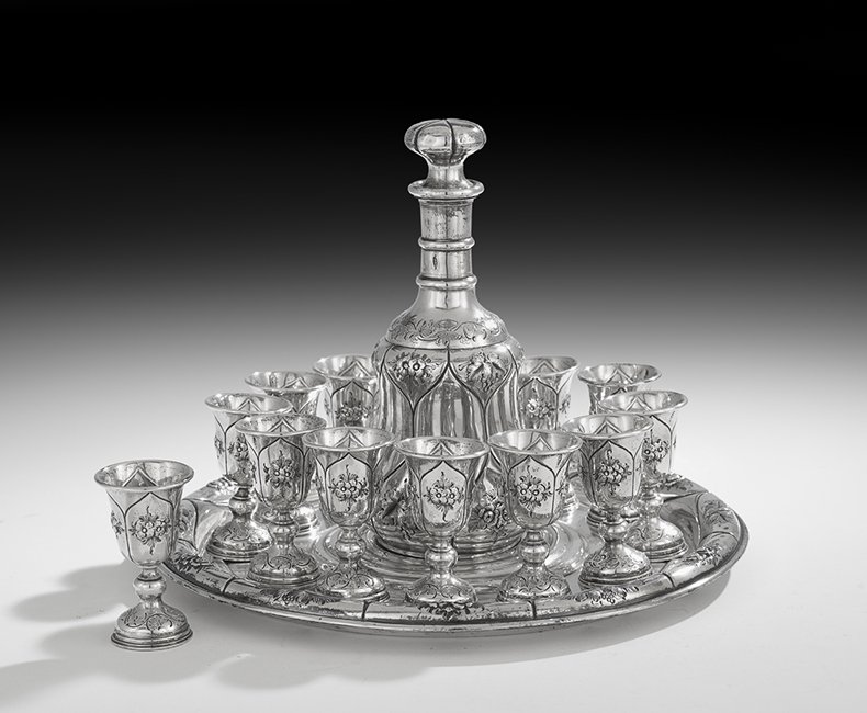 14-Piece Western Asian Silver Cordial Set: Fourteen-Piece Western Asian 84 Zolotnik (.875) Silver Cordial Set fourth quarter 19th century, probably Armenian, with Imperial Russian import marks, comprising a bottle, h. 9-1/2", dia. 4-1/4", twel
