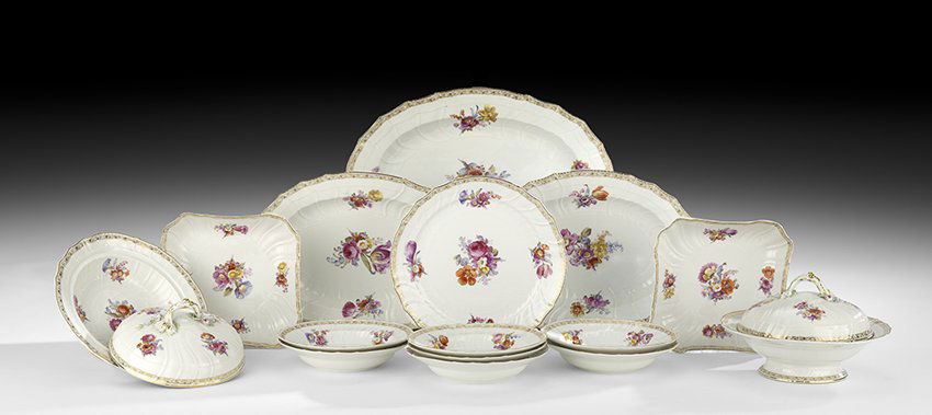 Fifteen Pieces of KPM Floral-Decorated Dinnerware: Fifteen Pieces of KPM Floral-Decorated Dinnerware ca. 1913, Berlin, Germany, each piece molded in a swirled, basket-weave pattern, and hand-painted with bouquets of flowers, the collection comprised o