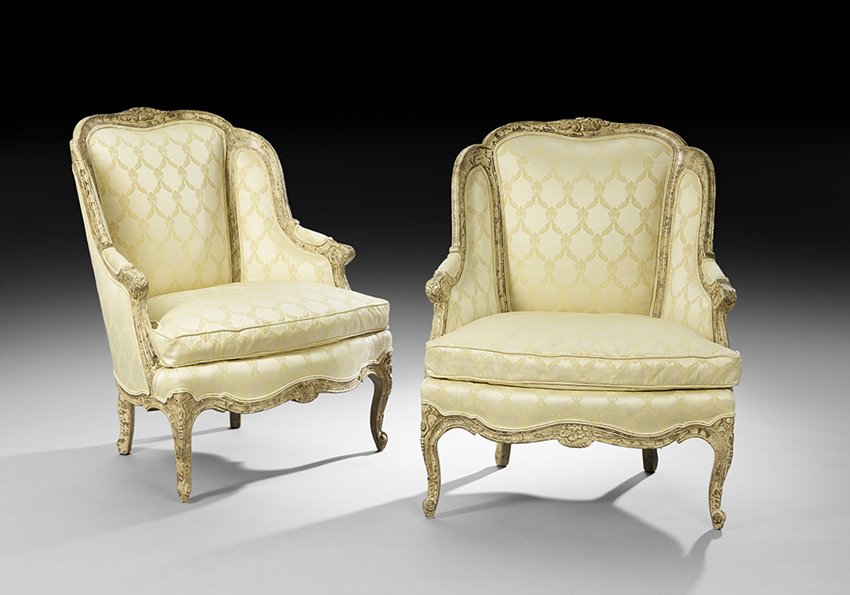 Pair of Louis XV-Style Bergeres avec Orielles: Pair of Louis XV-Style Polychrome Bergeres avec Orielles each with a padded trisected back surmounted by a floral crest, joined to the cushioned seat by padded arms, raised on molded cabriole legs end