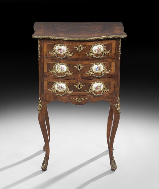 Louis XV-Style Fruitwood and Burlwood Commode: Louis XV-Style Fruitwood and Burlwood Commode early 20th century, the shaped rectangular top banded and within ormolu millwork, above a conforming case fitted with three drawers, all with inset Sevres