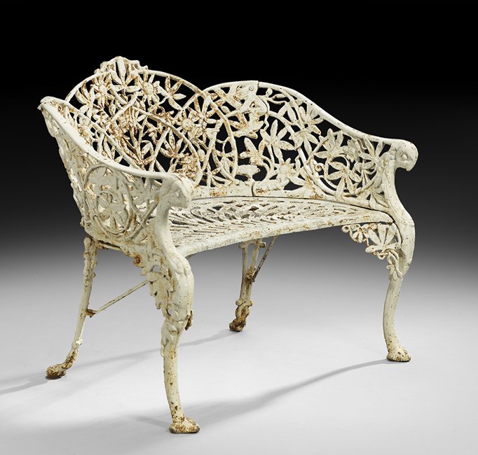 Cast Iron "Passion Flower" Pattern Garden Bench: Cast Iron "Passion Flower" Pattern Garden Bench late 19th/early 20th century, the pierced back modeled as twining flowers, vines and leaves, the arm supports terminating in avian heads, on cabriole fr