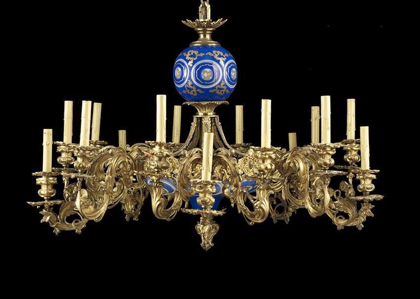 Bohemian Glass and Gilt-Bronze Chandelier: Exceptional Bohemian Overlay Glass and Gilt-Bronze Fifteen-Light Chandelier mid-19th century, composed of blue-plated glass cut to opaline, and decorated with gilt scrollwork, the scroll-molded bronze