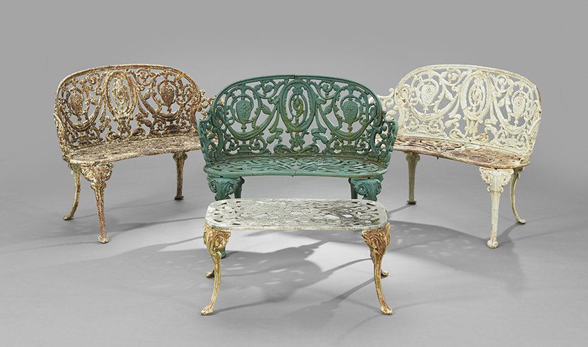 Four-Piece Cast Iron Garden Suite: Four-Piece Cast Iron Garden Suite, comprised of three settees in the "Versailles" pattern, h 30", w. 37", d. 20", together with a low table, h. 14", w. 29", d. 17".