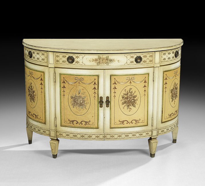 Edwardian-Style Polychrome Demi-lune Cabinet: Edwardian-Style Polychrome Demi-lune Cabinet, the demi-lune top above a conforming case fitted with a single central drawer over two paneled cupboard doors, all with central floral sprays, raised on t
